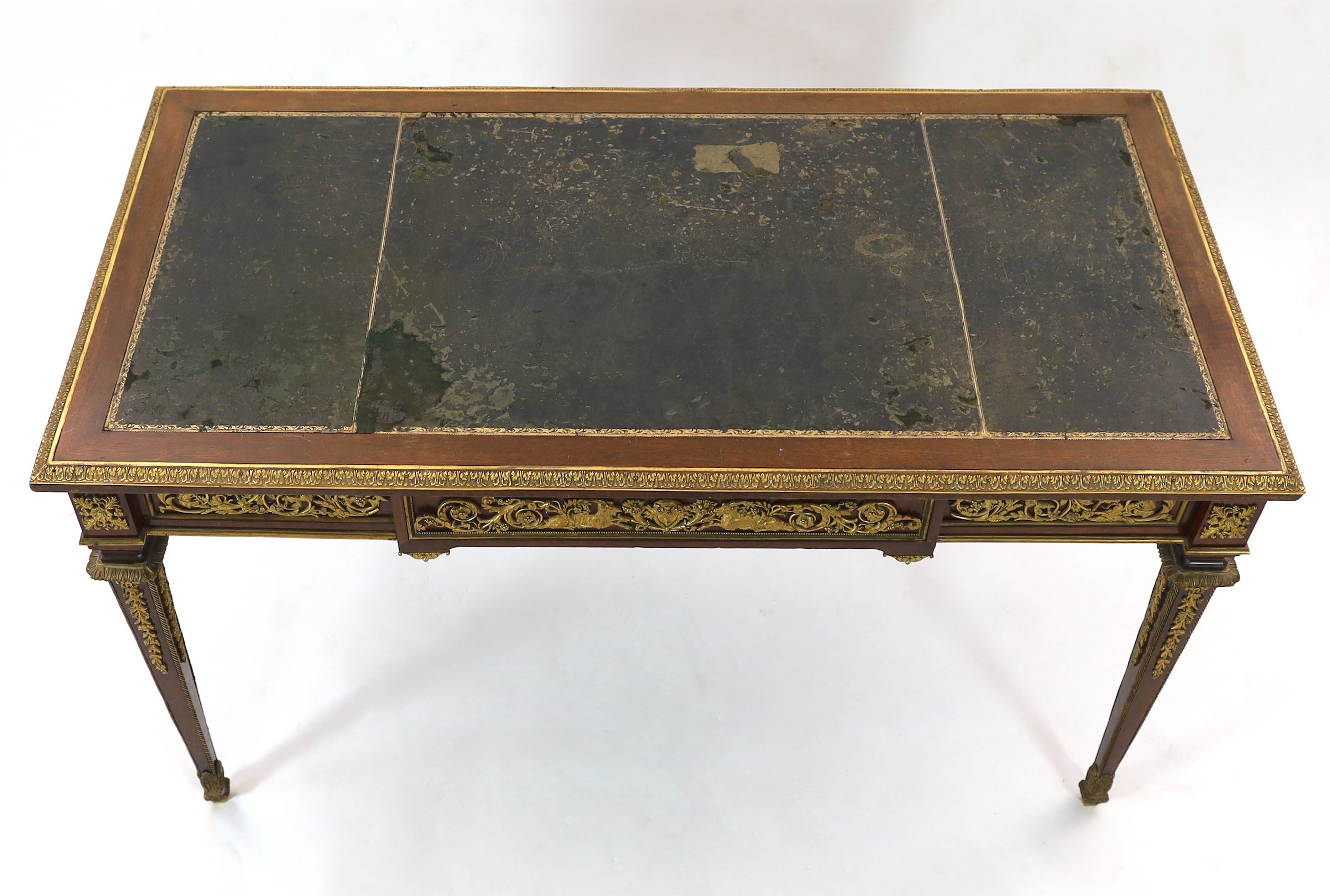 Francois Linke. A Louis XVI style gilt bronze mounted mahogany bureau plat, width 129cm depth 66cm height 74cm